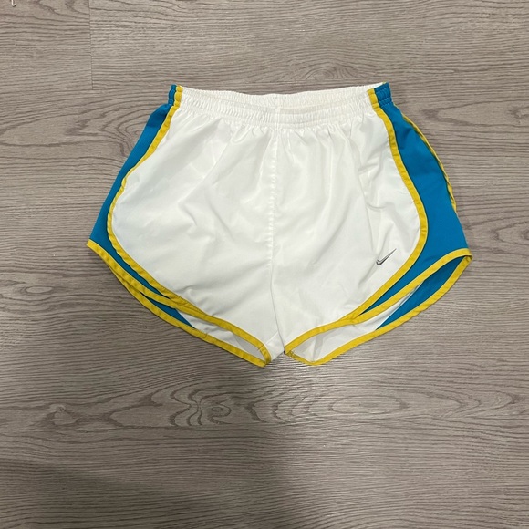 NIKE - women’s white athletic shorts w/ blue & yellow, size S, great condition - Picture 1 of 5